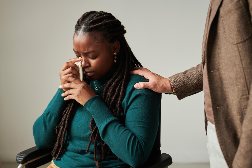 crying girl talking to psychologist