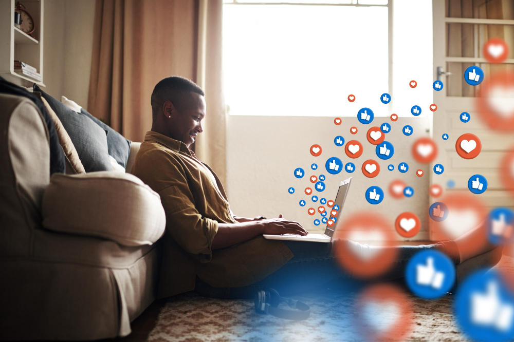 relaxed black man on laptop for communication text conversation on social media